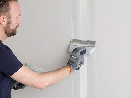 Limmande handspackel