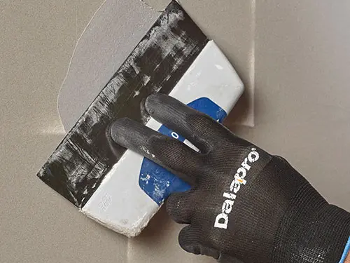 Dalapro Facade - grått utomhusspackel i för mindre lagningar, lättarbetat